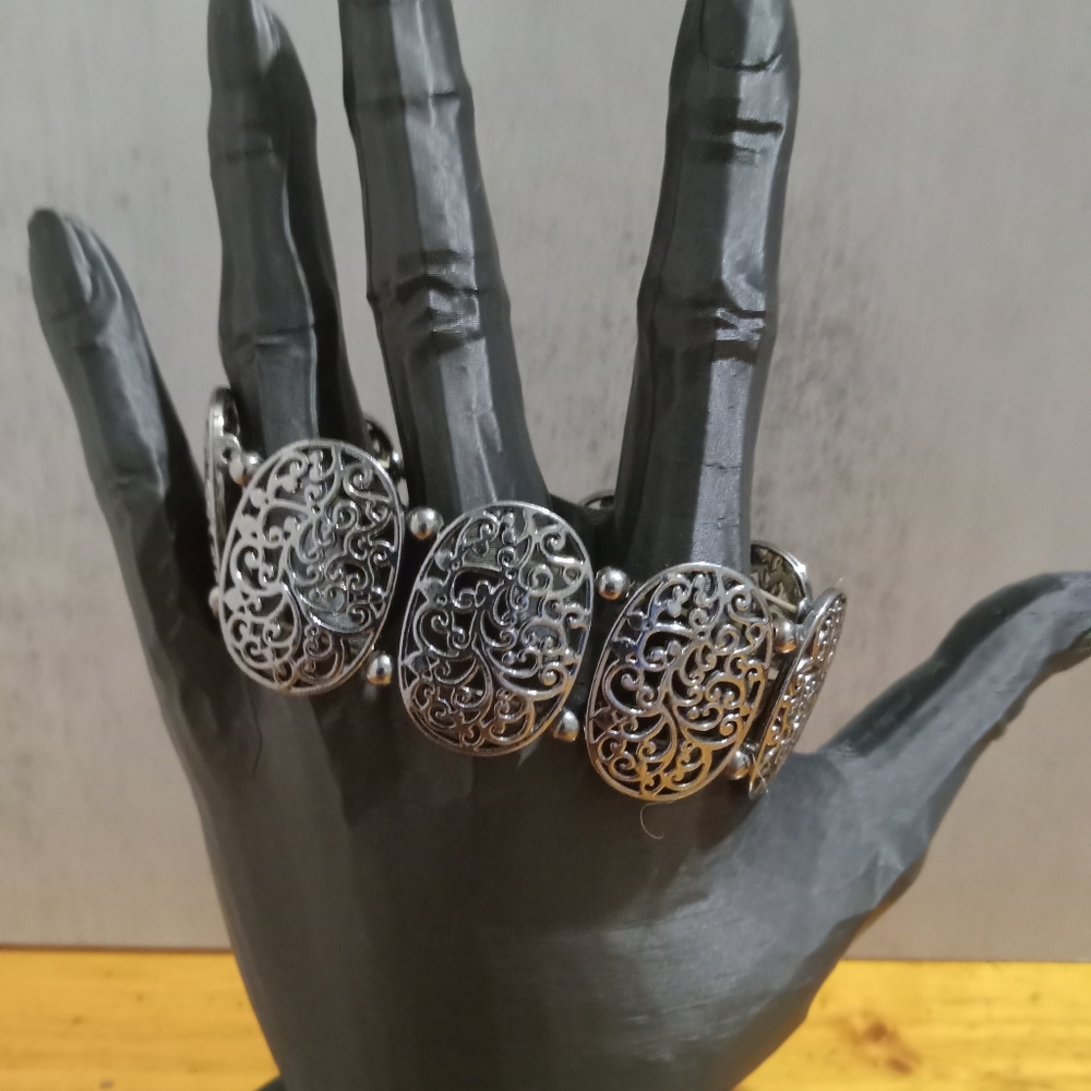 Silver Tone Filigree Bracelet with Ornate Patterns